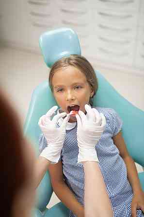 Удаление молочного зуба Санкт-Петербург